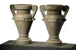 A pair of Italian carved Istrian stone urns, late 19th century  A pair of Italian carved Istrian