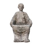 A carved limestone figural seat modelled as a goddess in the ancient Greek...  A carved limestone