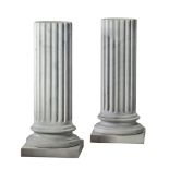A pair of Continental, probably Italian white marble columnar pedestals  A pair of Continental,
