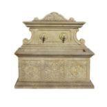 A Continental carved limestone wall fountain in early 17th century style  A Continental carved