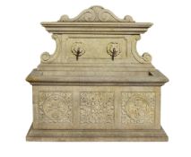 A Continental carved limestone wall fountain in early 17th century style  A Continental carved