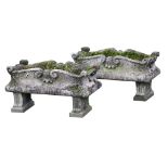 A pair of French carved limestone planters in Louis XIV style  A pair of French carved limestone