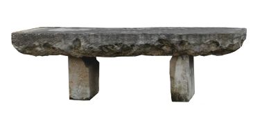 A massive Continental limestone garden dining table , 20th century  A massive Continental