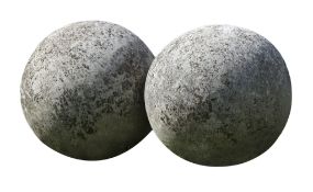 A pair of Continental limestone spheres, probably late 19th century  A pair of Continental limestone