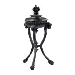 A Continental painted cast iron flambeau urn on stand garden centrepiece  A Continental painted cast