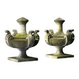 A pair of large Continental carved limestone urn finials, 20th century  A pair of large