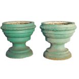 A pair of Continental blue painted cast iron garden urns, 18th century  A pair of Continental blue