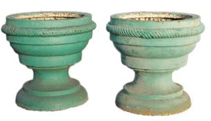 A pair of Continental blue painted cast iron garden urns, 18th century  A pair of Continental blue