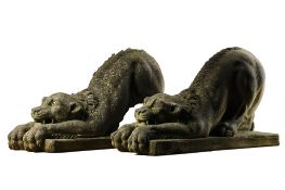 A pair of Continental sculpted limestone models of lions, 20th century  A pair of Continental