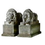 A pair of sculpted limestone models of recumbent lions, after Antonio Canova  A pair of sculpted