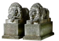 A pair of sculpted limestone models of recumbent lions, after Antonio Canova  A pair of sculpted