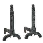 A pair of massive Continental cast iron fire dogs, 17th century  A pair of massive Continental