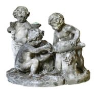 A sculpted limestone group of three Bacchic putti, late 19th century  A sculpted limestone group
