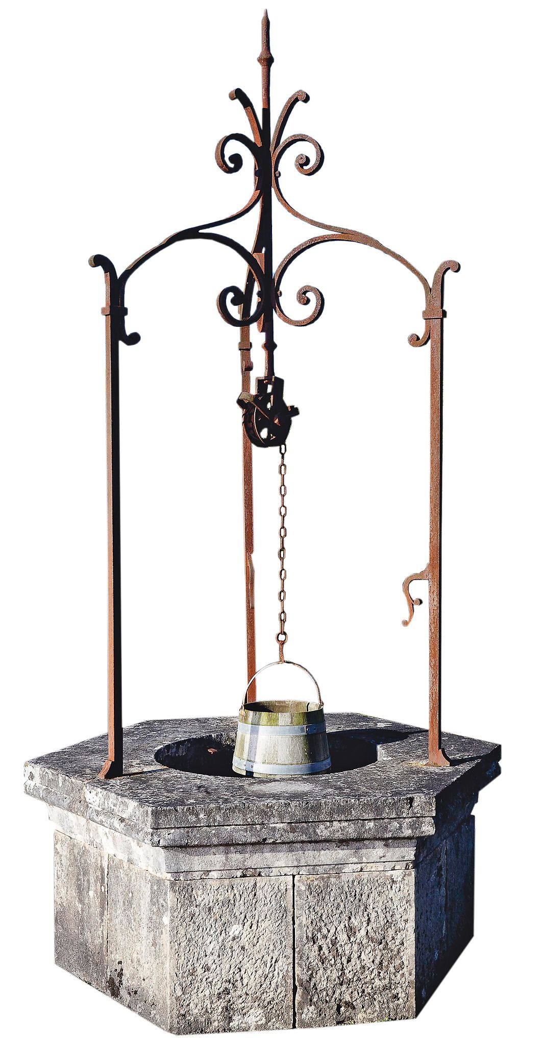 An Italian carved Istrian stone and wrought iron mounted wellhead, 19th century An Italian carved