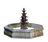 A French cast iron fountain and limestone pool surround, late 19th century  A French cast iron