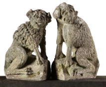 A pair of French sculpted limestone models of watchdogs, early 18th century  A pair of French
