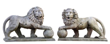 A pair of Continental sculpted marble models of lions, early 20th century  A pair of Continental