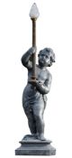 A Dutch cast zinc figural torchere, late 19th century, cast as a putto  A Dutch cast zinc figural