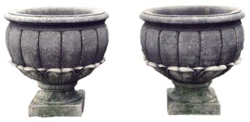 A pair of French carved limestone planters, 20th century  A pair of French carved limestone
