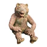 A Continental terracotta model of a seated bear , 20th century  A Continental terracotta model of