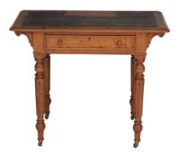A Victorian oak writing table , circa 1870, in the manner of Gillows  A Victorian oak writing table