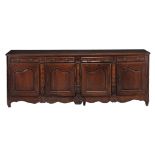 A French oak dresser base , early 19th century  A French oak dresser base  , early 19th century, the