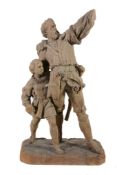 A Continental, almost certainly Swiss sculpted wood group of William Tell...  A Continental,
