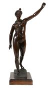 A Continental patinated bronze model of a female nude  A Continental patinated bronze model of a