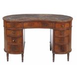 A Howard and Sons mahogany kidney desk, circa 1900  A Howard and Sons mahogany kidney desk,