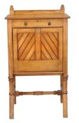 An Aesthetic ash secretaire  , circa 1870, the top with moulded edge above single frieze drawer and
