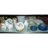 A quantity of decorative ceramics to include a ceramic and glass cheese cover, table lamps, jugs etc