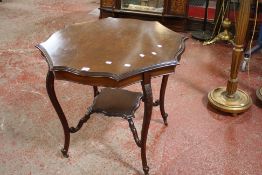 An Edwardian mahogany centre table with a scalloped top 84cm diameter, a burr walnut and walnut