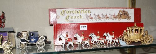 A Lesney Coronation coach, with box, The Royal State coach, with box, another coronation coach (
