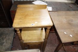 A Victorian oak bedside cupboard and an Arts and Crafts oak occasional table