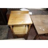 A Victorian oak bedside cupboard and an Arts and Crafts oak occasional table