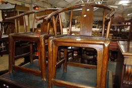 A pair of Chinese hardwood chairs. One a/f.
