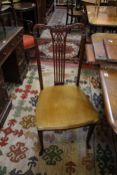 A set of four Edwardian mahogany dining chairs with pierced splats to include one armchair   Best
