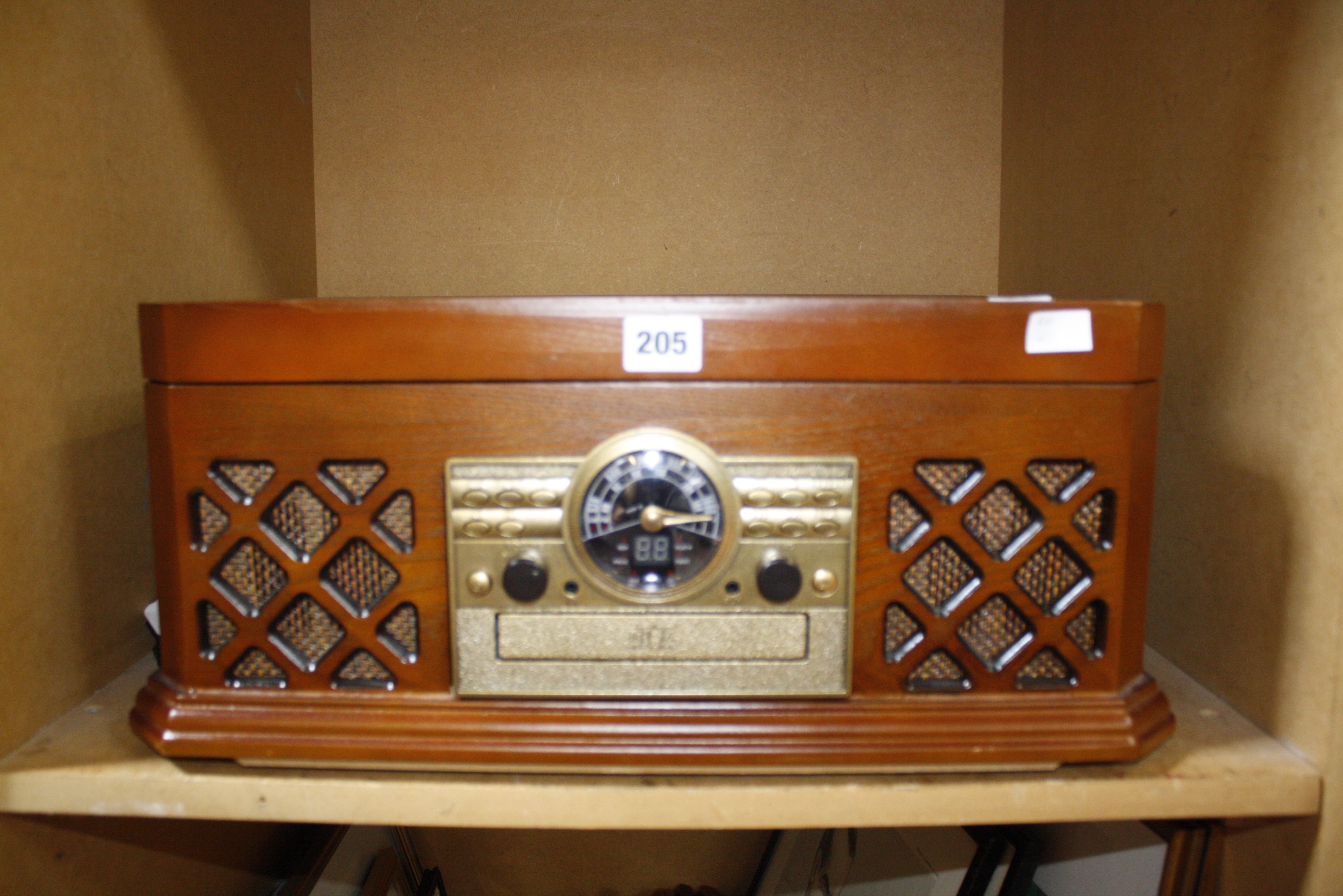 A Zennox turntable with CD player, with instruction manual