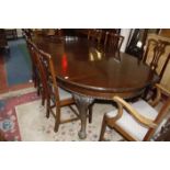 A Georgian style mahogany dining table 234cm extended