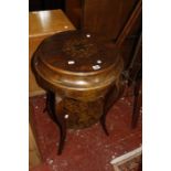 An inlaid two tier lady's work table.