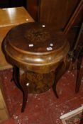 An inlaid two tier lady's work table.