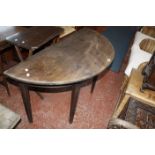 A George III mahogany demi lune table on square tapering legs 122cm wide