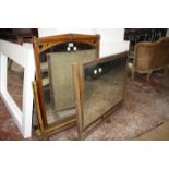 A Victorian mahogany and ebonised swing frame mirror 83cm high, 62cm wide, together with a further