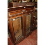 A 19th Century rosewood glazed cabinet 105cm high, 89cm wide   Best Bid