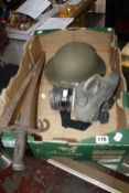 A WWII gas mask, two bayonets, WWII British army steel helmet and a kukri knife (5)  Best Bid