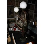 A modern Art Deco style lamp, female figure holding two globe shades, 87cm high approx. (sold as