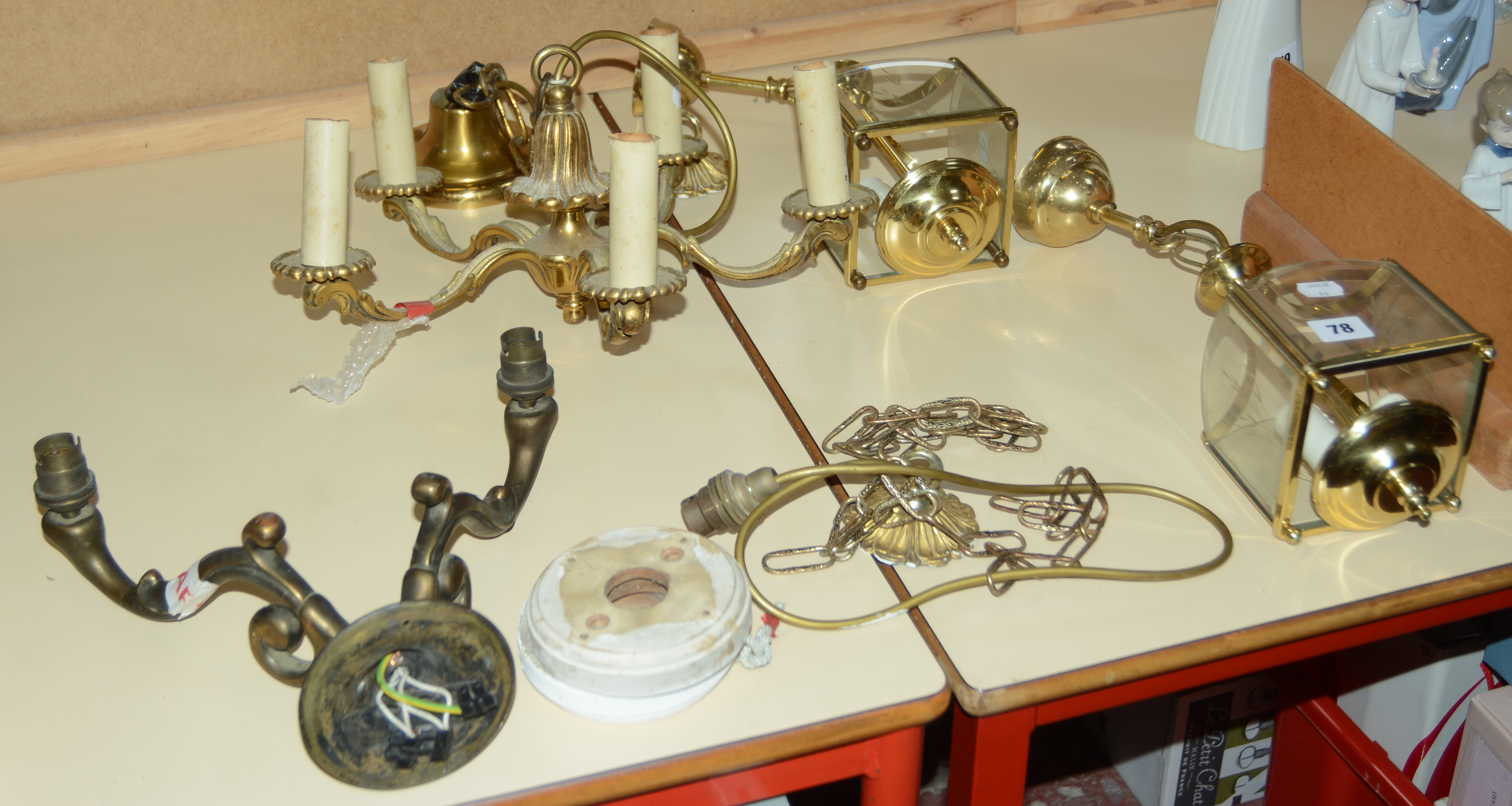 A 20th Century brass five light electrolier, a twin branch wall light and a pair of modern brass and