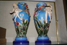 A pair of modern Majolica vases, baluster shaped, blue ground, decorated with relief maidens and