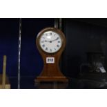 An Edwardian mahogany balloon mantel clock, 22cm high