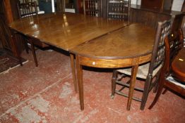 A George III mahogany D-end dining table with two leaves 253cm extended